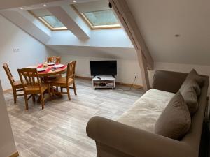 Appartements Le cosy de la vologne : photos des chambres