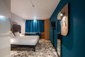 Hotels B&B HOTEL Paris Nord 2 CDG Aeroport : photos des chambres