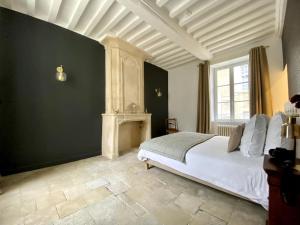 Appartements BAYA HOUSE - Histoire et Confort : photos des chambres