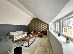 Appartements BAYA HOUSE - Histoire et Confort : photos des chambres