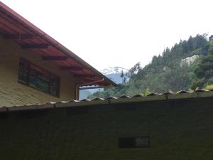 "Casa Verde" en Baños de Agua Santa con vista al volcán Tungurahua