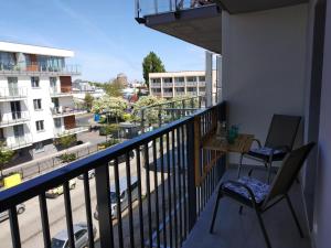 Apartament Kapitalny przy porcie w Kołobrzegu z rowerownią i placem zabaw