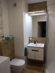 Apartament Kapitalny przy porcie w Kołobrzegu z rowerownią i placem zabaw