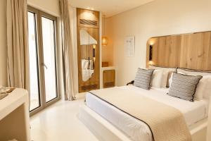 Deluxe Suite with coastal view room in White Pebble Suites