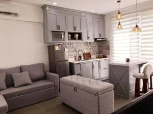 Cozy Holiday Home at Batulao Artscapes 2Br brand new fully airconditioned - Tabla