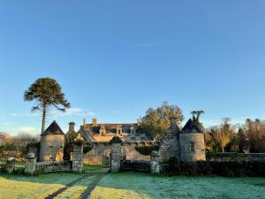 Maisons de vacances Le Gite les NUZ ( parc du chateau de Kerouartz) : photos des chambres