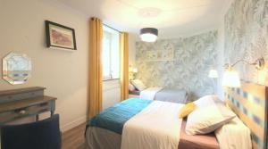 B&B / Chambres d'hotes B&B Ferme De La Tourelle : Chambre Triple