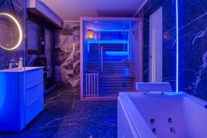 Appartements Appart Hotel avec Sauna, Jacuzzi, : photos des chambres