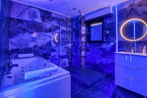 Appartements Appart Hotel avec Sauna, Jacuzzi, : photos des chambres