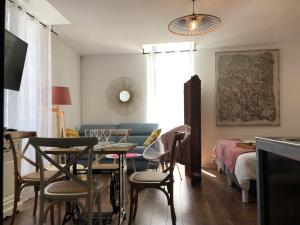 Appartements LES APPART'S DES DEMOISELLES DE ROCHEFORT : photos des chambres