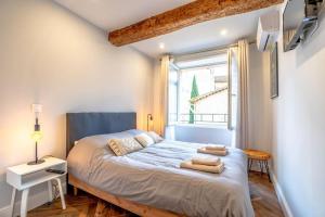 Appartements Superbe appartement neuf, climatise centre village : photos des chambres