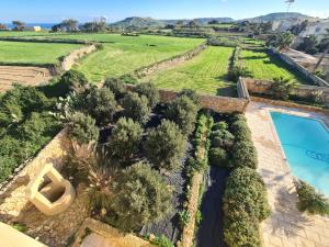 Beautifully Converted Farmhouse Villa In Gozo with Large Pool and Outdoor Area