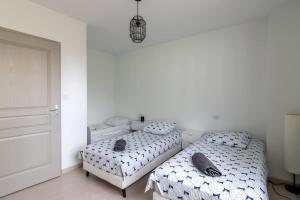 Appartements Superbe Appartement : photos des chambres