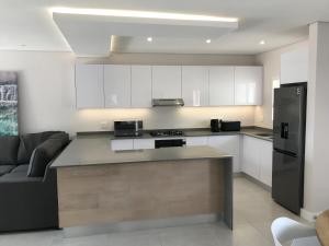 Stylish Sea View Apartment in Santorini Estate.