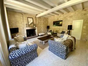 Maisons de vacances Magnifique maison en pierre avec belle piscine : photos des chambres
