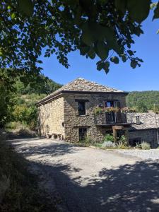 Country old stone house immerse in nature