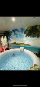 Appartements Sparadisejacuzzi : photos des chambres