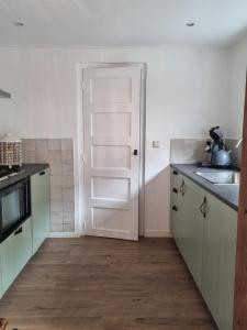 cottage near the beach in the center.****