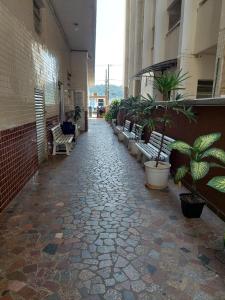 Apto frente à praia, aconchegante, vista lateral pro mar!