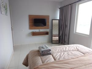 AR Putra at Sentul Tower Apartment by Rindu