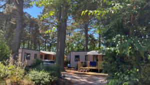 Campings Sunelia Le Petit Bois : photos des chambres