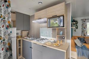 Campings Sunelia Le Petit Bois : photos des chambres