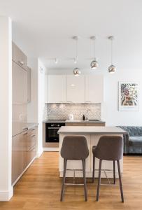 Wola Bloom Apartment by BookingHost