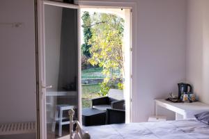 Maisons d'hotes La Halte Gourmande : photos des chambres