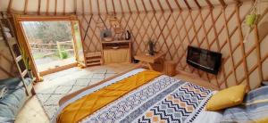 Tentes de luxe Yourte des Verts Bois : photos des chambres