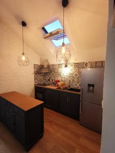 Appartements Le loft jeanne : photos des chambres