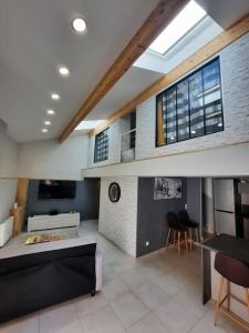 Appartements Sweet LOFT A PERIGNAT !!! : photos des chambres