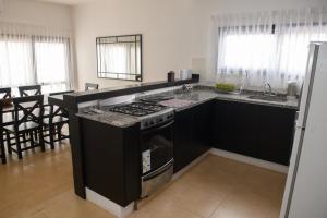 Departamento con terraza y quincho con asador