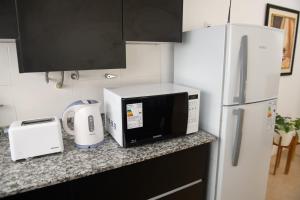 Departamento con terraza y quincho con asador