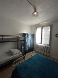 Appartements Lilas, Gite Saint Antoine, Orcival, Entre Sancy et Volcans. : photos des chambres