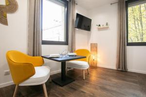 Appartements Le Maleville - Balneo & Ascenseur : photos des chambres