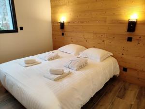 Chalets Chalet Lignum, Exceptionel - Sauna & SPA - vue sur les montagnes, 8 minutes des pistes. : photos des chambres