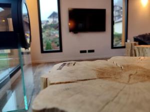 Chalets Chalet Lignum, Exceptionel - Sauna & SPA - vue sur les montagnes, 8 minutes des pistes. : photos des chambres