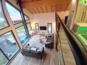 Chalets Chalet Lignum, Exceptionel - Sauna & SPA - vue sur les montagnes, 8 minutes des pistes. : photos des chambres