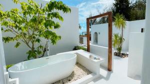 Cape by Sichon Tesoro