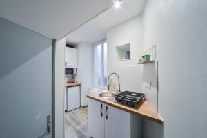 Appartements Appart OPALE rdc - parking gratuit- Netflix : photos des chambres