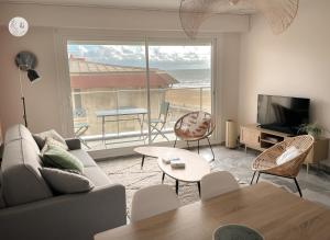 Appartements Au85, Bel appartement, vue ocean, pied de la plage : photos des chambres