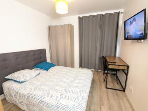 Appartements Beau-Jean, Un Cocon Sympa 5 min a Pied du Centre-Ville, Parking Prive, a 10 min du CHU : photos des chambres