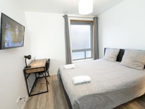 Appartements Beau-Jean, Un Cocon Sympa 5 min a Pied du Centre-Ville, Parking Prive, a 10 min du CHU : photos des chambres