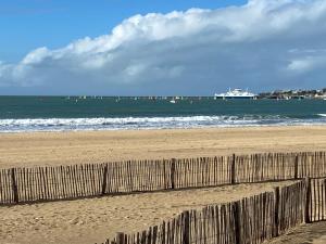 Appartements Proche plage de Royan, vue mer, equipements modernes, confort : photos des chambres