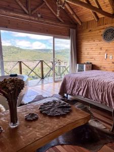 @lacascatachales Chalé Curucaca