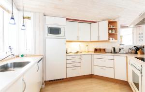 Four-Bedroom Holiday Home In Ronne