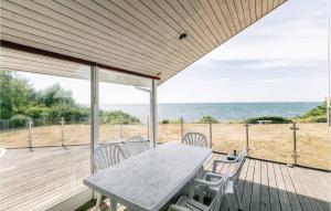 Four-Bedroom Holiday Home In Ronne