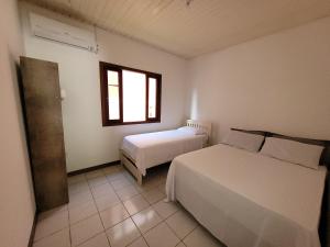 Partiu Praia SC- Piscina, Ar condicionado, wi-fi, duas quadras da praia e centrinho