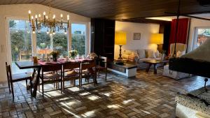 Large holiday apartment with sauna, terrace, garden and open fireplace