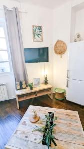 Appartements Cosy Tropical -2ch -Centre-ville - GARAGE PRIVATIF - WIFI Haut debit : photos des chambres